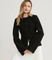 Knit vest black with bell sleeves and black buttons full body view