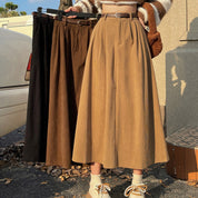 Midi skirt camel and black colors side view with belt