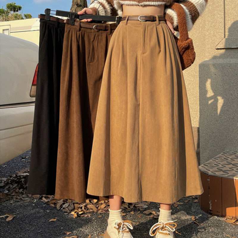 Midi skirt camel and black colors side view with belt