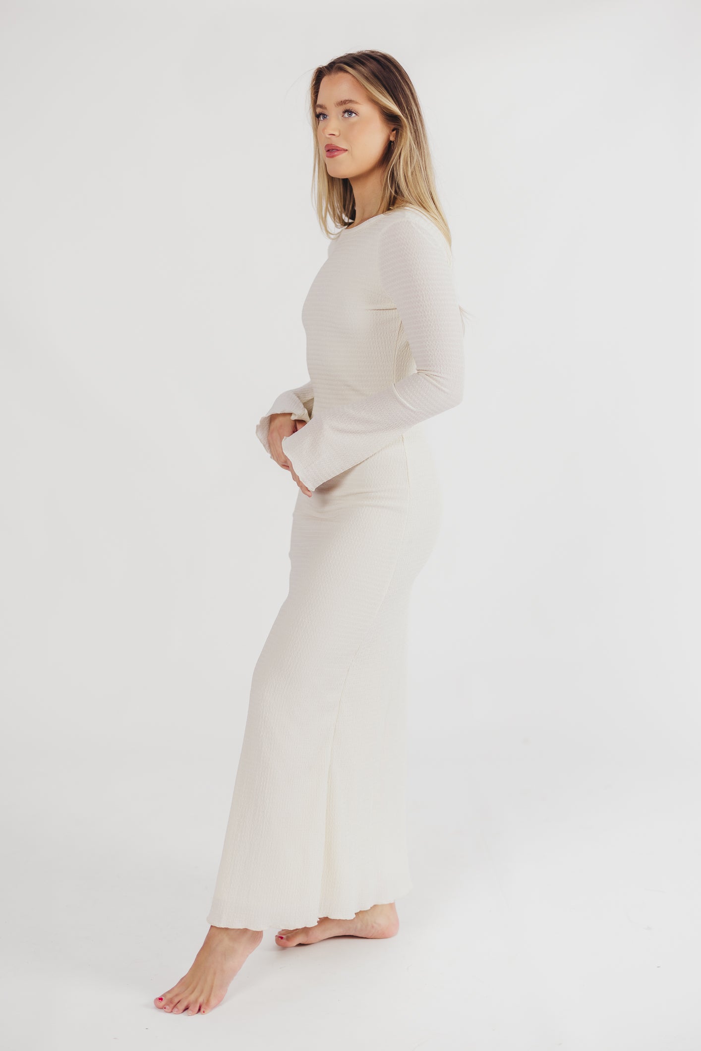 Cream textured maxi dress with bell sleeves front view