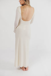 Cream textured maxi dress with bell sleeves back view