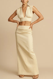 Beige ruched maxi skirt and crop top hands-on-hips front view
