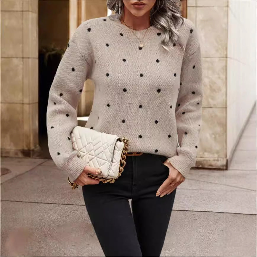 Light gray knit sweater with black polka dots front view