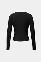 Black long-sleeve crop top back view