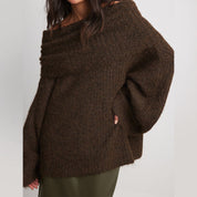 Close-up of brown off-shoulder knit sweater