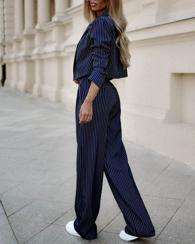 Blue striped blazer and pants set side profile