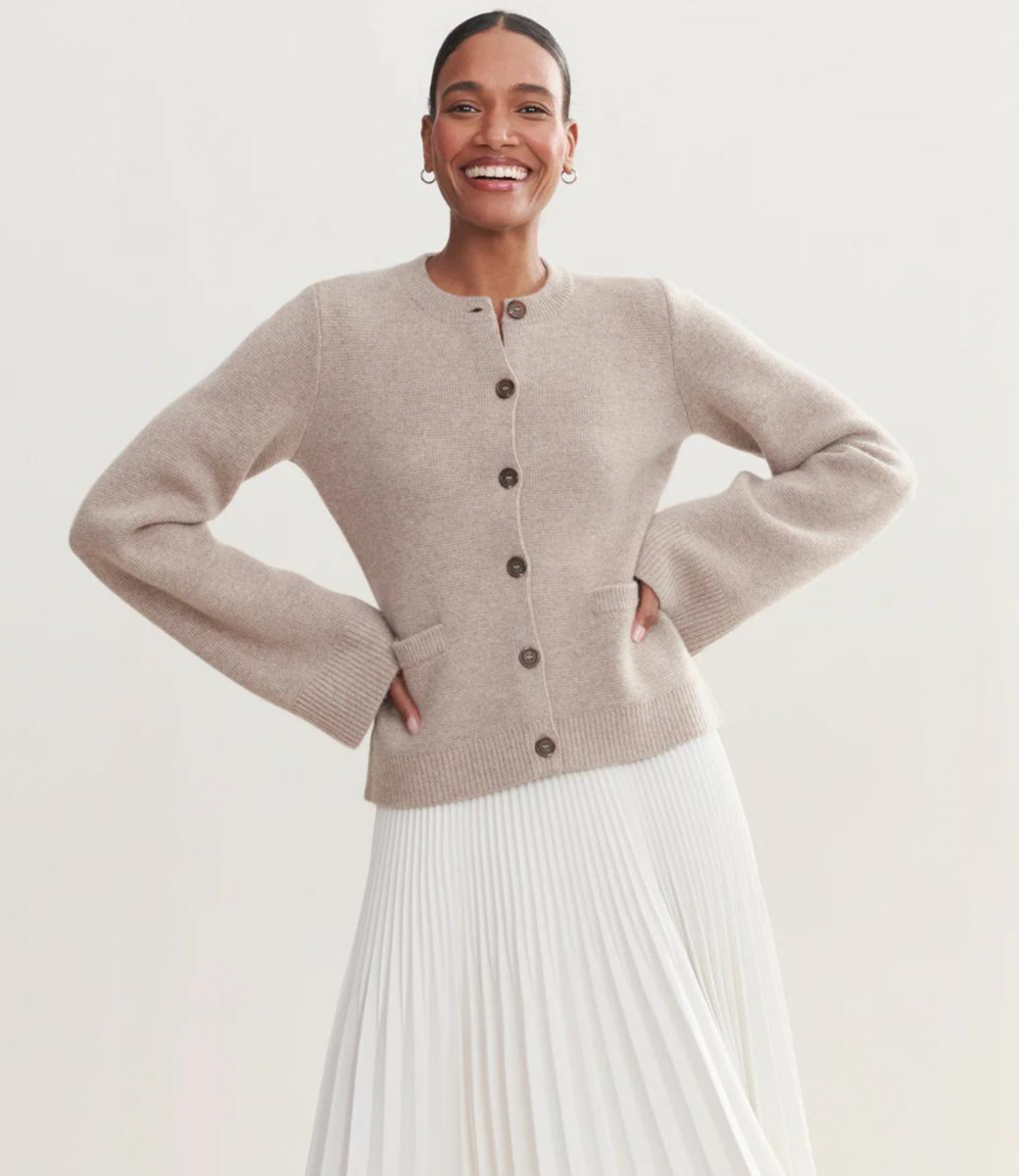 Knit vest beige with bell sleeves and brown buttons full body view