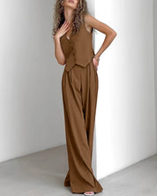 Brown pinstripe jumpsuit three-quarter view