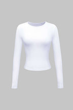 White long-sleeve crop top front view on model
