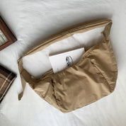 Schoudertas beige met witte binnenkant open detail