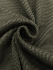 Close-up of army green bodysuit fabric texture