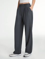 Wide-leg trousers with pleated detail in dark gray angled view
