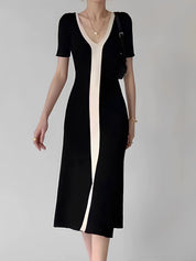 Black and white striped dress with V-neck front view