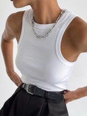 White ribbed tank top front view with silver chain necklace