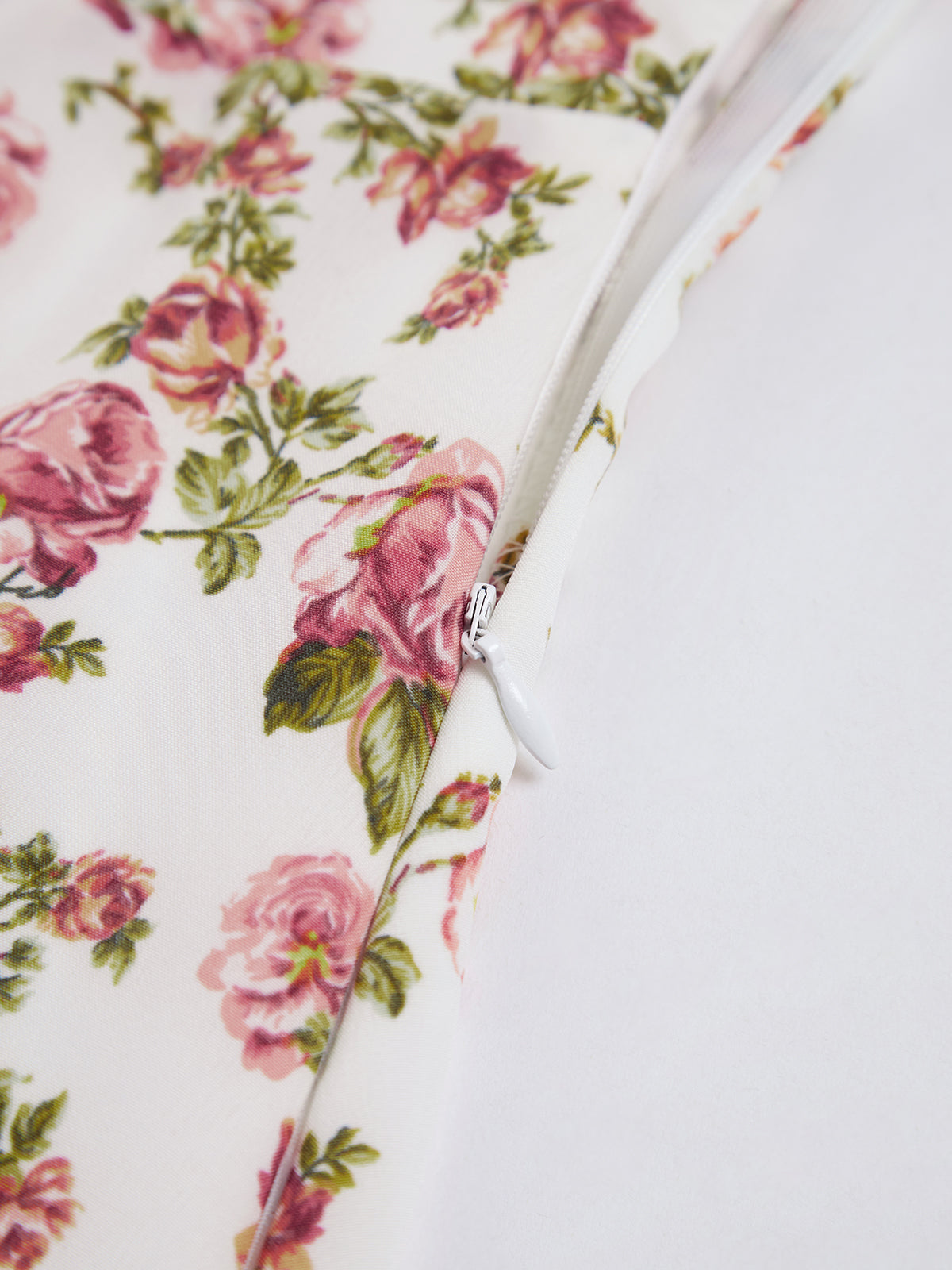 Floral print dress with side slit, close-up of waist tie