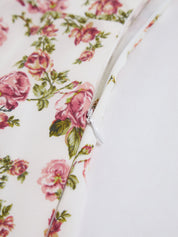 Floral print dress with side slit, close-up of waist tie