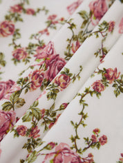 Floral print dress with side slit, close-up of fabric pattern