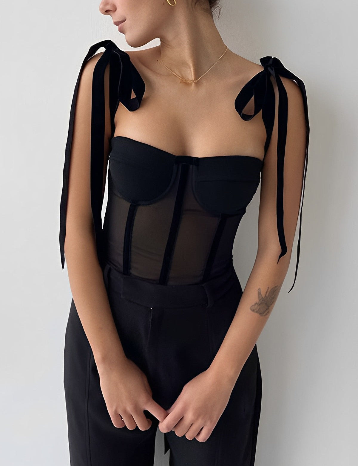 Doorzichtige mesh bustiertop zwart met strikjes front view