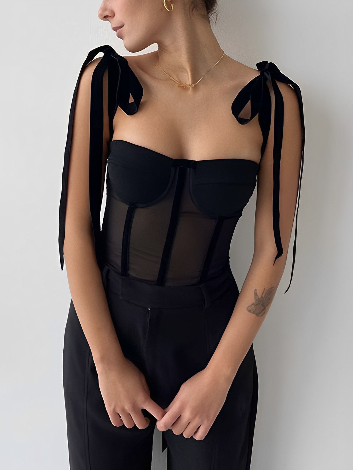 Doorzichtige mesh bustiertop zwart met strikjes front view