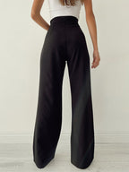 Zwarte damesbroek met hoge taille en wijde pijpen, front view