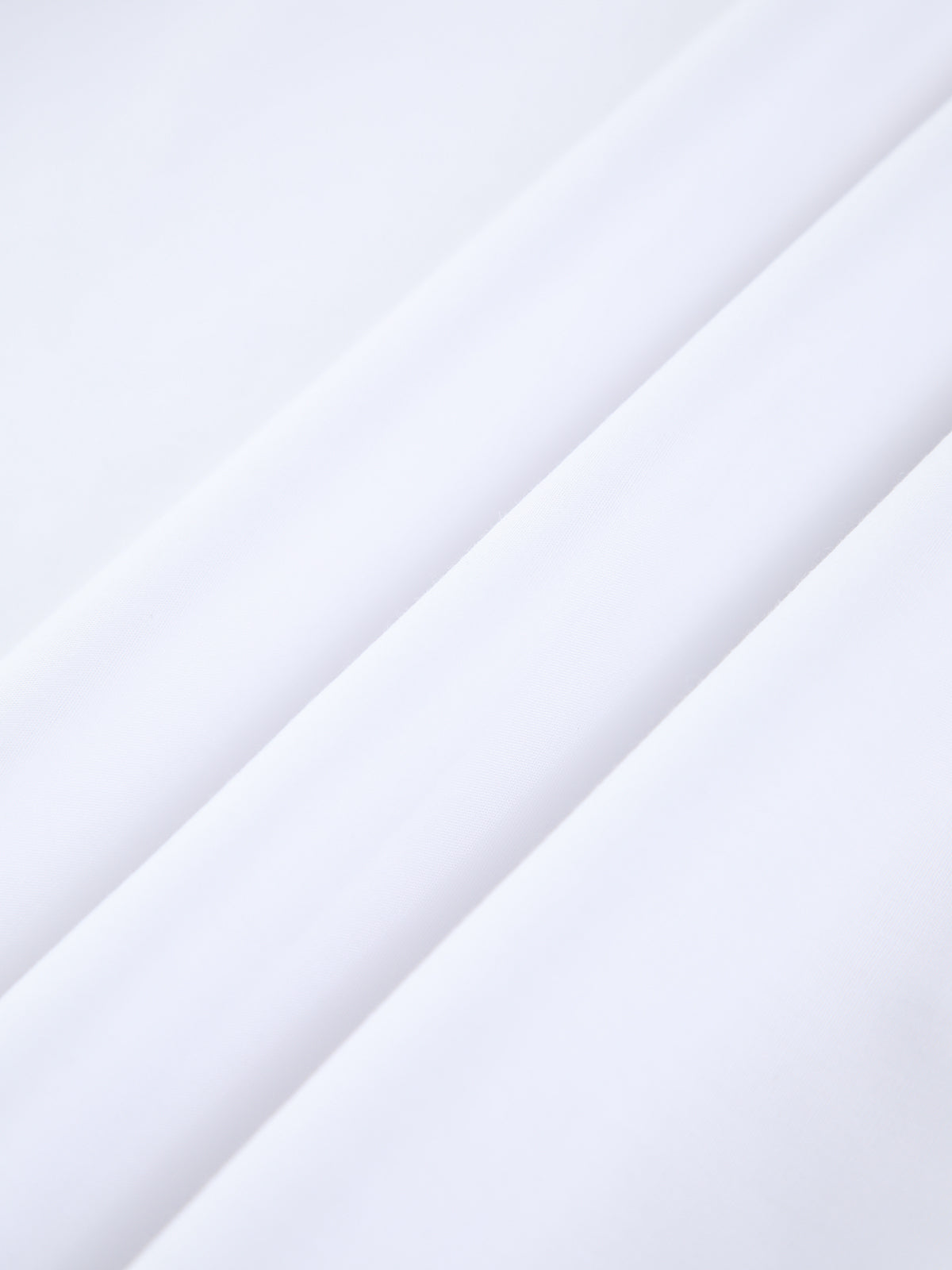 White summer dress fabric detail, close-up
