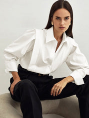 Witte blouse met pofmouwen en knoopsluiting vooraanzicht