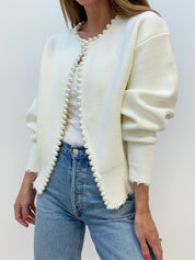 Cream cardigan with pearl embellishments front view