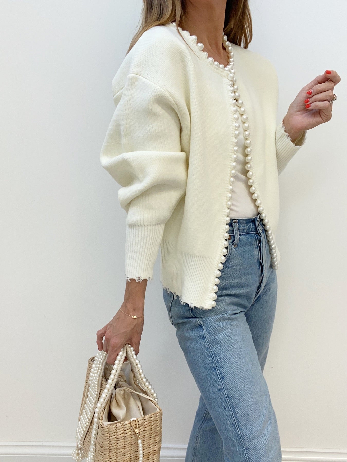 Cream cardigan with pearl embellishments full body view