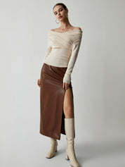 Cream off-shoulder sweater with draped neckline, full-body view