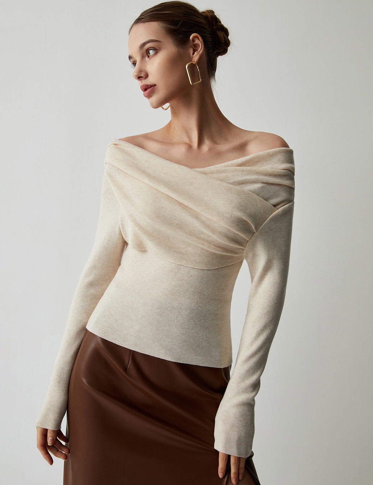 Cream off-shoulder sweater with long sleeves, front view