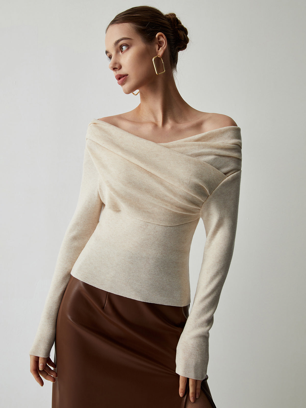 Cream off-shoulder sweater with long sleeves, front view