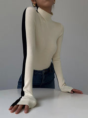Knitted turtleneck sweater black and white side view