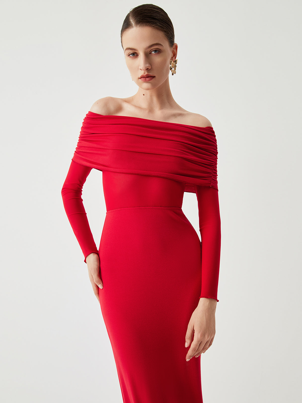 Red off-shoulder dress with ruched bodice side view