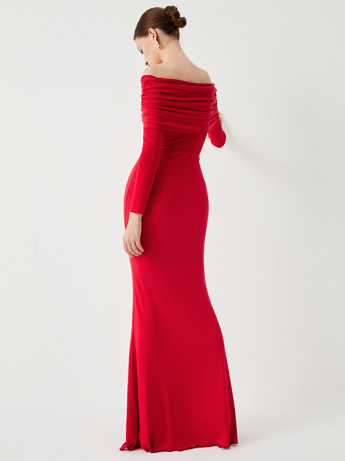 Red off-shoulder dress with ruched bodice side profile