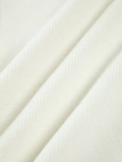 Cream cardigan knit texture close-up
