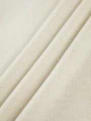 Knitted turtleneck sweater white fabric detail