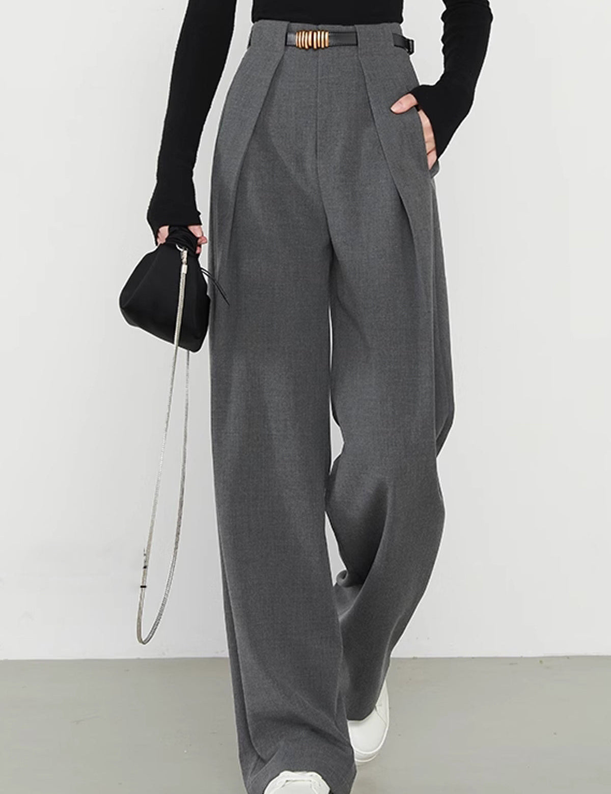 Gray wide-leg trousers with gold belt buckle side view