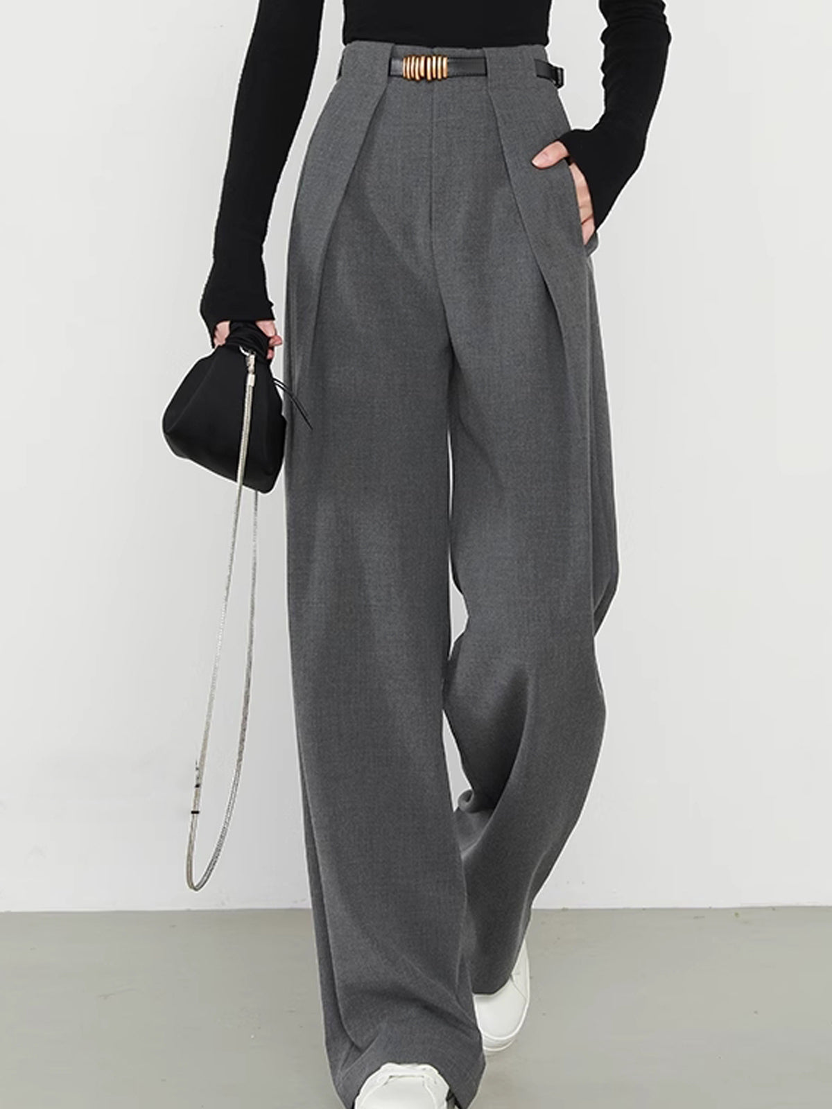 Gray wide-leg trousers with gold belt buckle side view