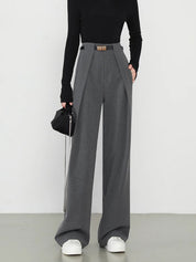 Gray wide-leg trousers with gold belt buckle front view
