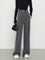 Gray wide-leg trousers with gold belt buckle front view