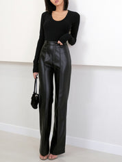 Black faux leather wide-leg pants front view