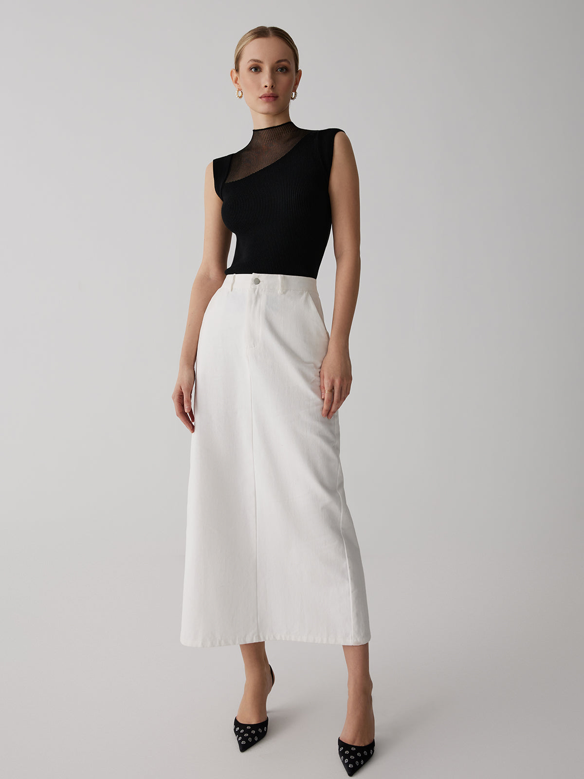 Black ribbed sleeveless top with sheer panel full body view