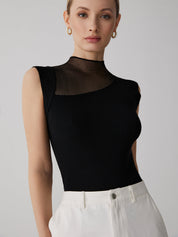Black ribbed sleeveless top with sheer panel front view