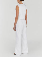 White linen set with wide-leg pants and buttoned top, back view