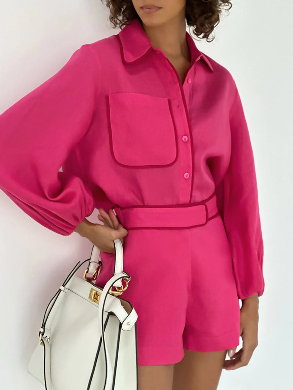 Pink linen shirt and shorts set close-up of shirt details