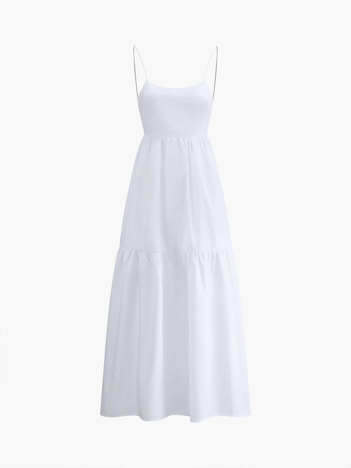 White maxi dress with thin straps and tiered skirt, front view