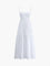White maxi dress with thin straps and tiered skirt, front view