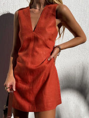 Orange linen dress with deep V-neck front view