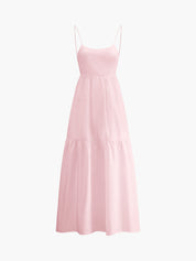Pink maxi dress with thin straps and tiered skirt, front view
