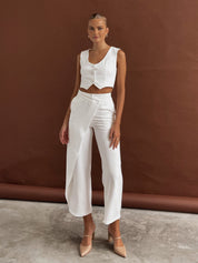 Two-piece set white front view with hands on hips
